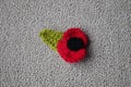 Hand made crochet poppy for Remembrance Day Royalty Free Stock Photo